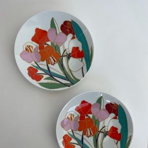 A pair of German Rosenthal Studio-Linie porcelain hand painted plates, signed.